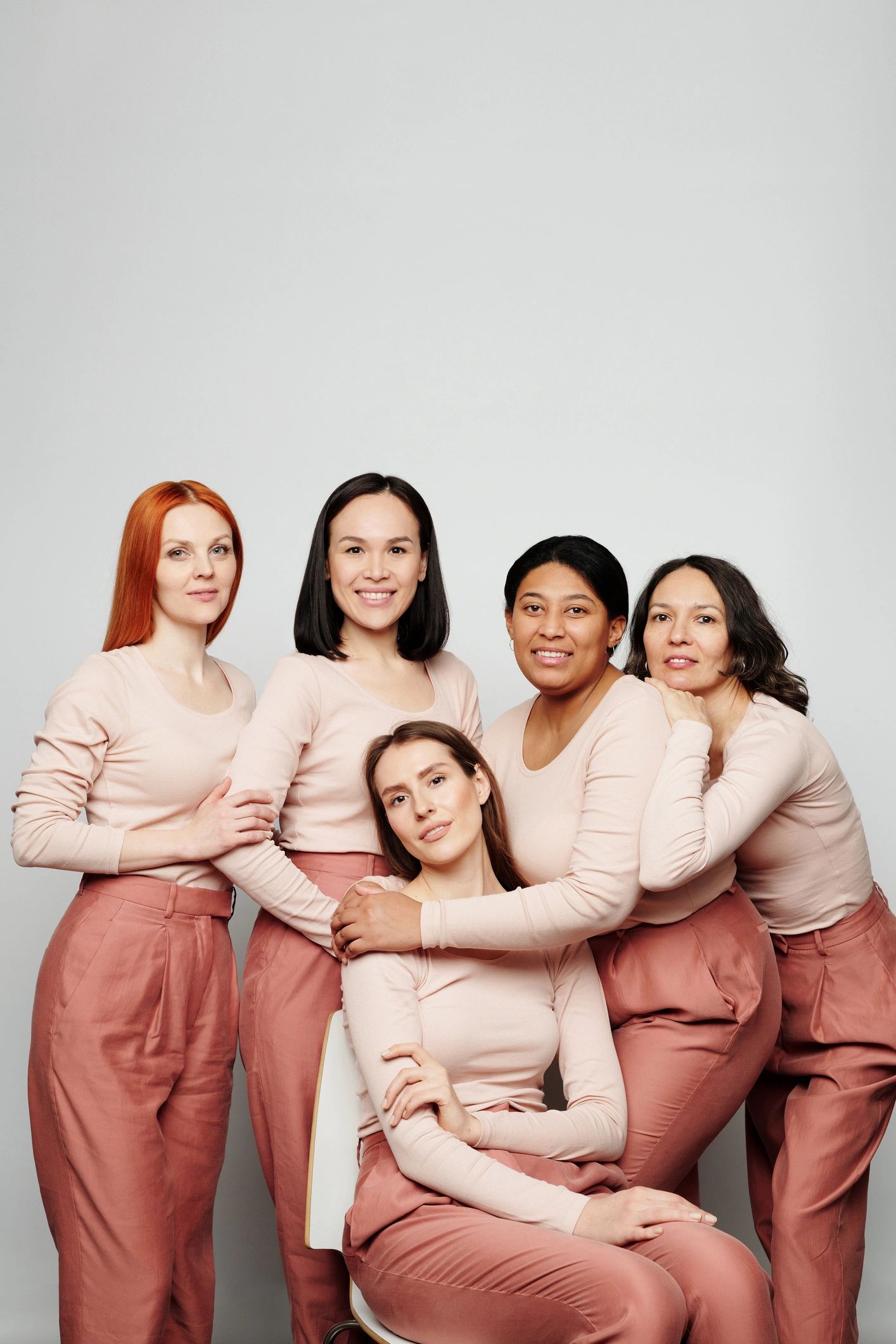 Close-knit group embracing with encouragement