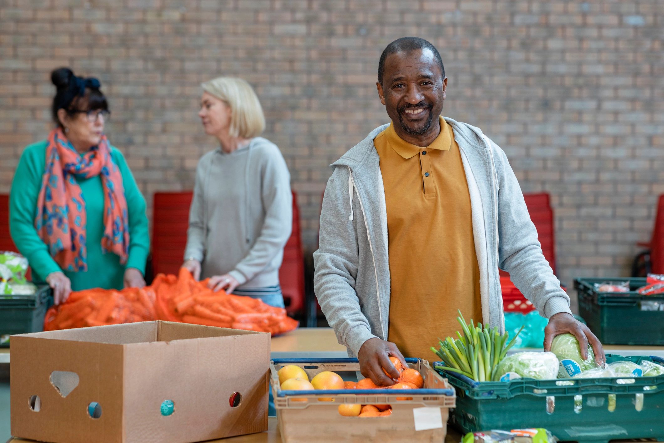 Community volunteers working together in support of others