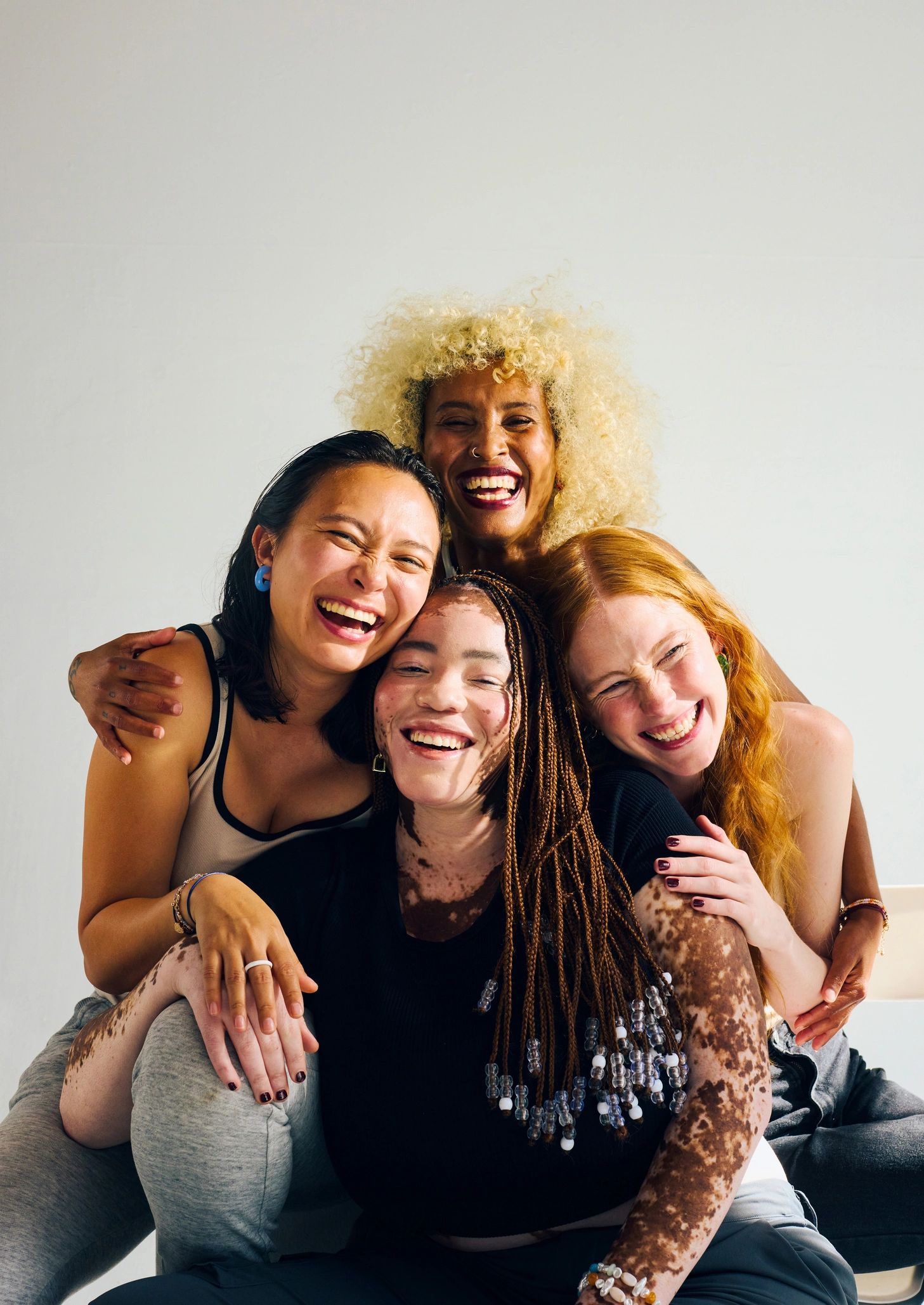 Supportive team members smiling together