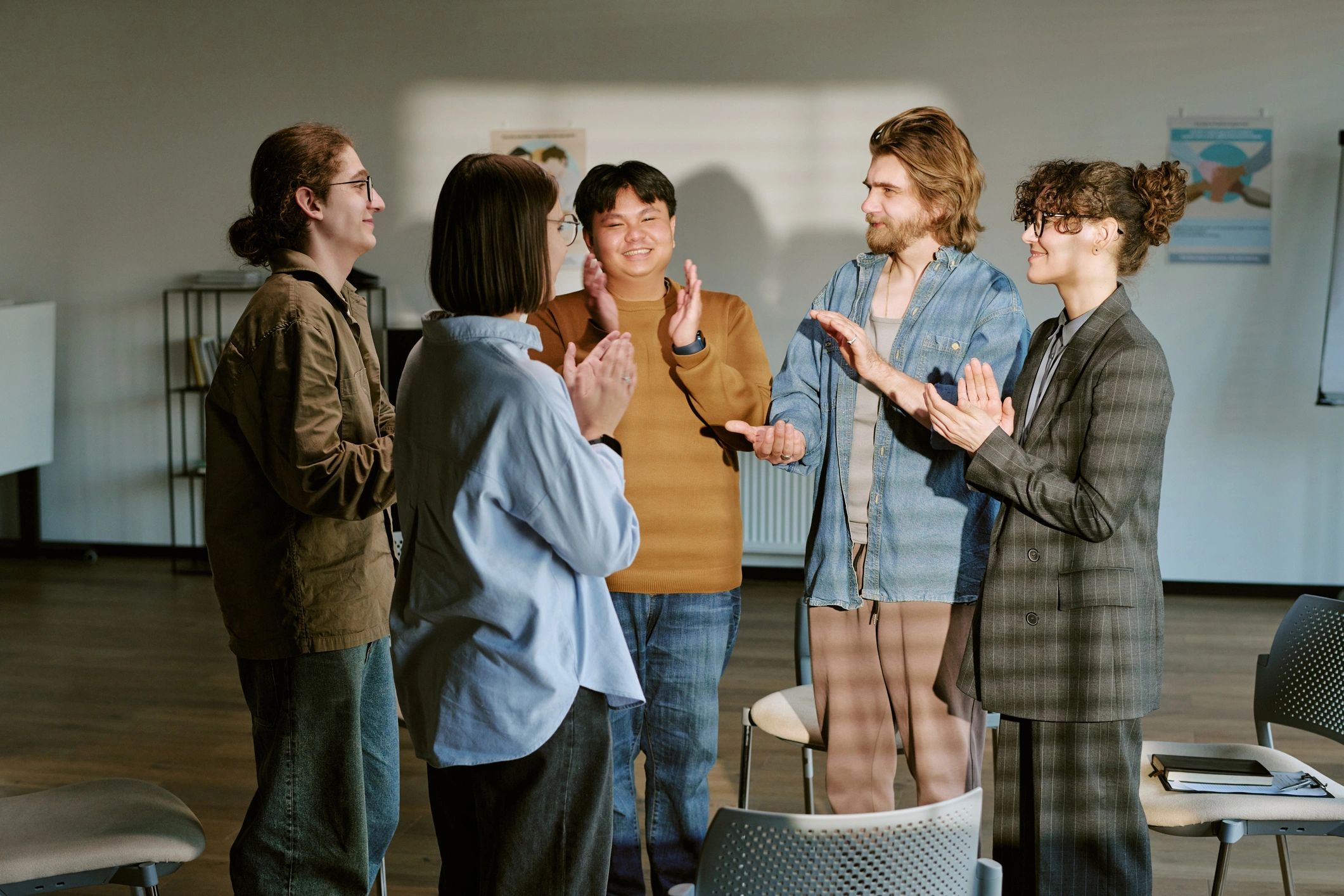 People encouraging one another during a support session