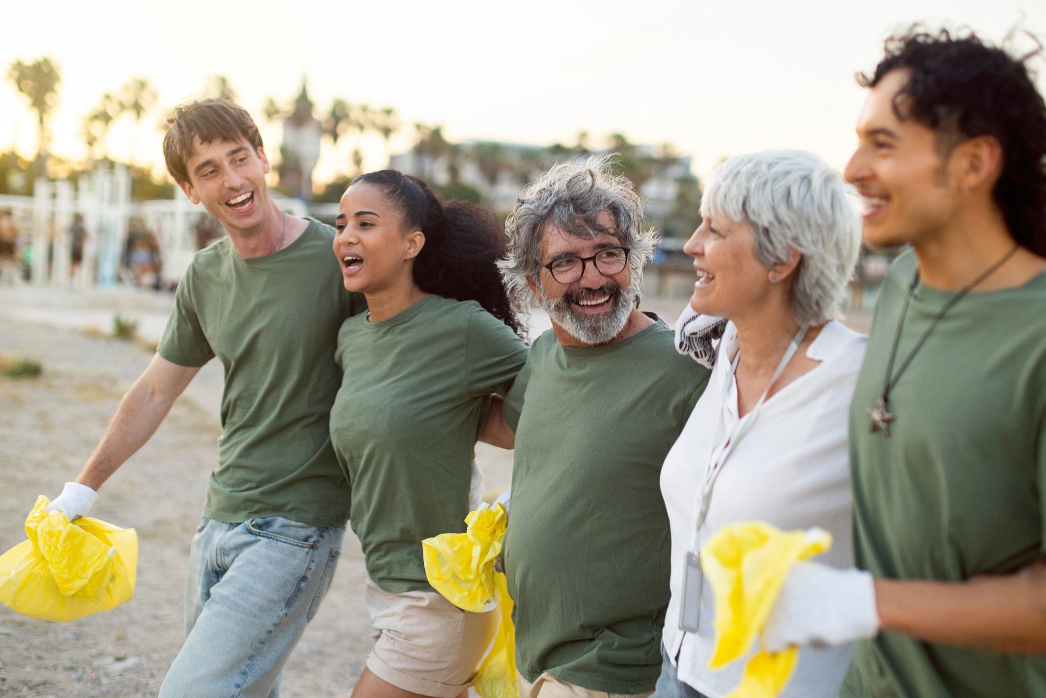 Volunteers walking together in celebration after a community service project